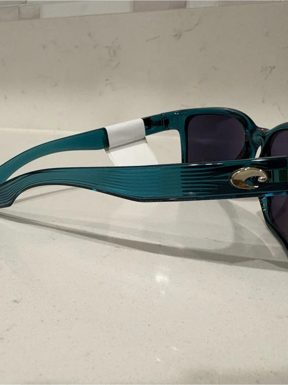 Costa Teal Frame Sunglasses with Gray Silver Mirror Lenses
